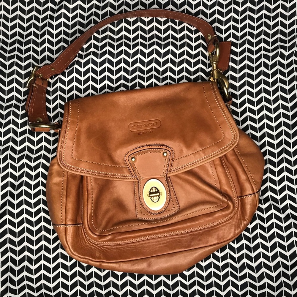 Coach - Vintage purse with gold lock closure.